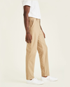 Side view of model wearing True Chino Comfort Knit Chinos, Straight Fit.