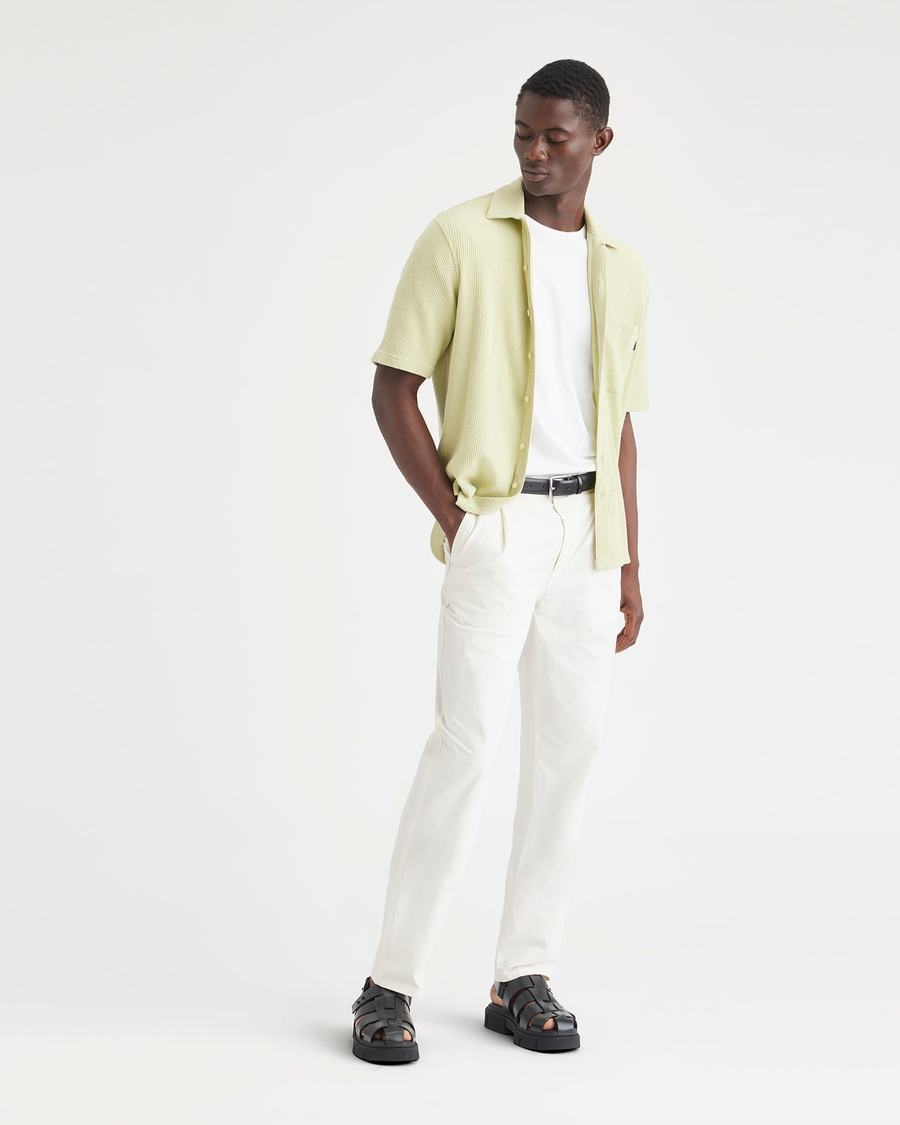 View of model wearing Undyed Cottom Hemp Original Chinos, Relaxed Tapered Fit.