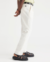 Side view of model wearing Undyed Cottom Hemp Original Chinos, Relaxed Tapered Fit.