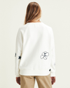 Back view of model wearing Undyed Greige Dockers® x Maud Le Car Icon Sweatshirt.