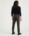 Back view of model wearing Verve Forest Night Workday Khakis, Slim Fit.
