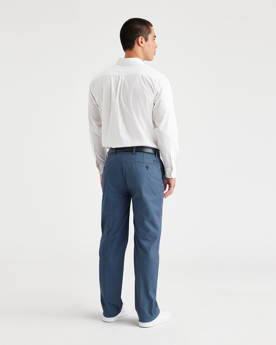 Back view of model wearing Vintage Indigo City Tech Trousers, Straight Fit.