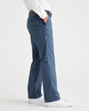 Side view of model wearing Vintage Indigo City Tech Trousers, Straight Fit.