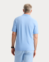 View of model wearing Vista Blue Rib Collar Polo, Slim Fit.