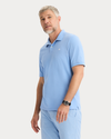 View of model wearing Vista Blue Rib Collar Polo, Slim Fit.