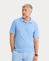 View of model wearing Vista Blue Rib Collar Polo, Slim Fit.