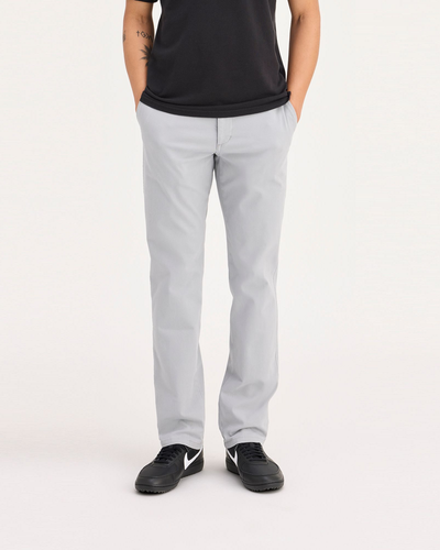 Front view of model wearing Wet Stone Ultimate Chinos, Slim Fit.