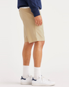 Side view of model wearing Wheat California 8" Shorts.
