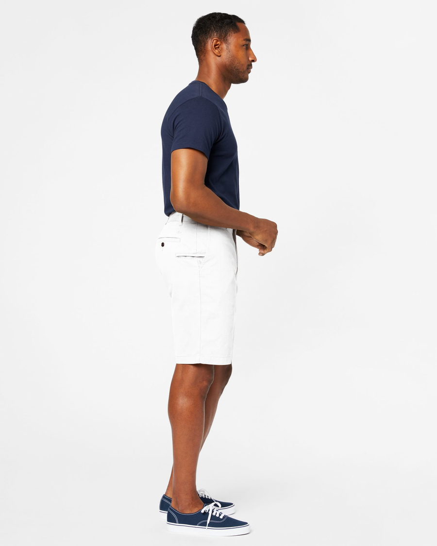 Side view of model wearing White Cap Perfect 10.5" Shorts.