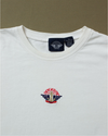 View of model wearing White Dockers® Embroidered Logo Tee Shirt, Slim Fit - M.