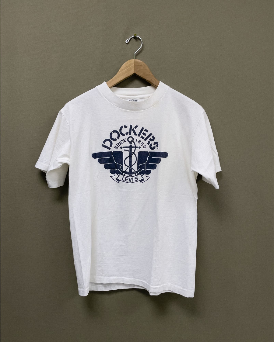 Front view of model wearing White Dockers Logo Puff Print Tee - M.