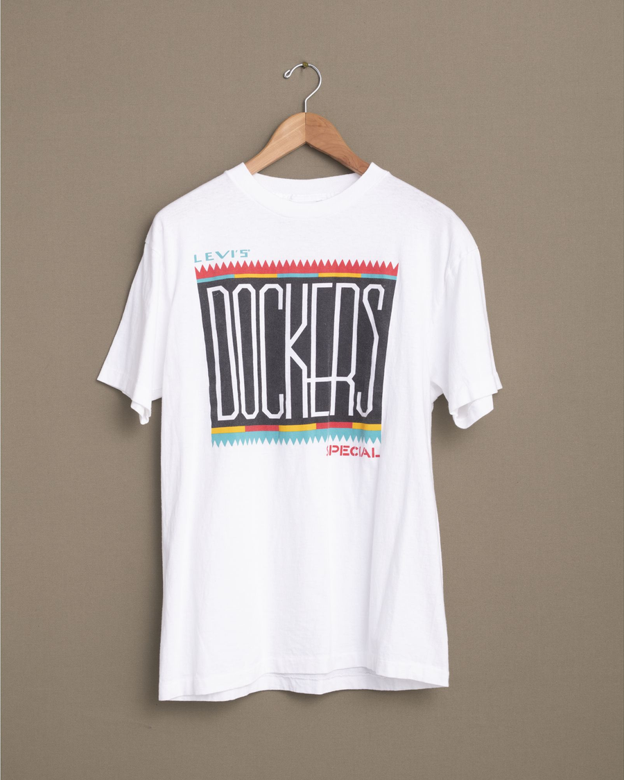 Front view of model wearing White Dockers Special Tee - M.