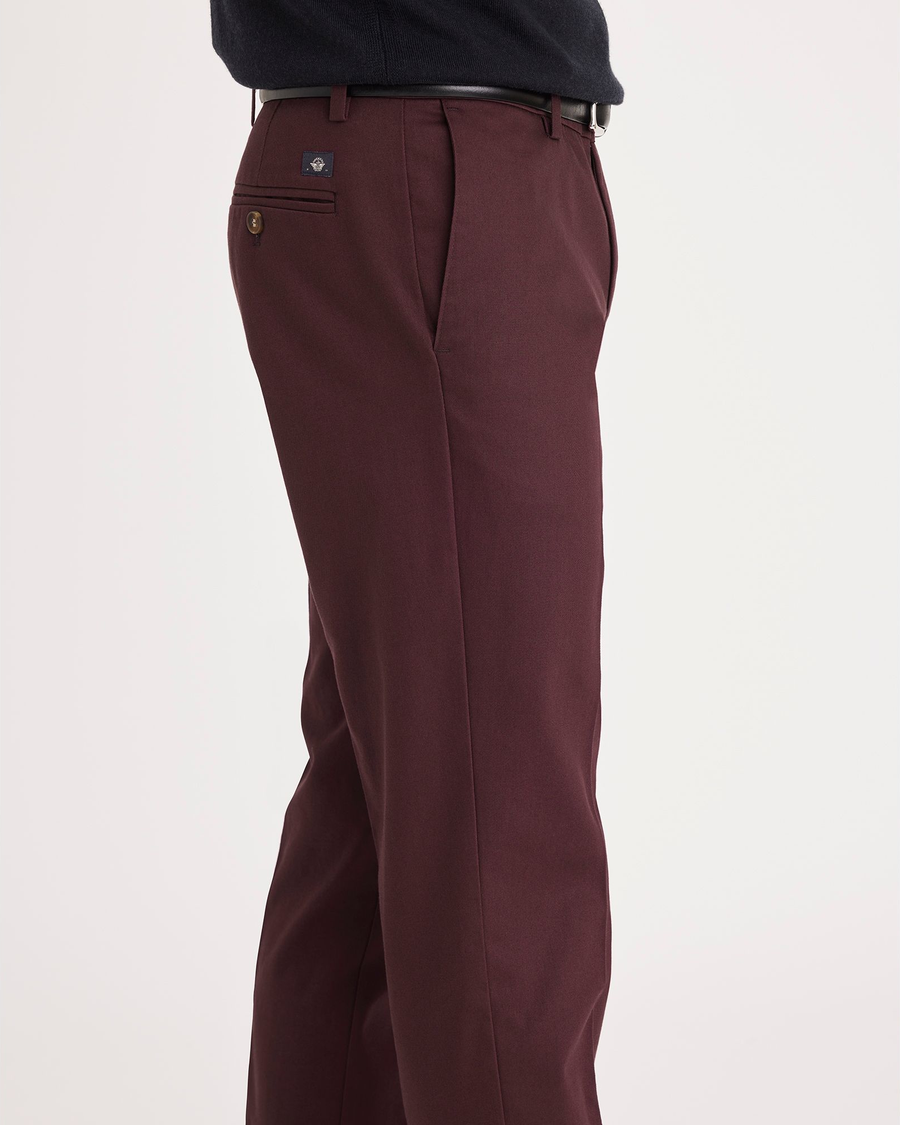 Side view of model wearing Winetasting Signature Iron Free Khakis, Slim Fit with Stain Defender®.